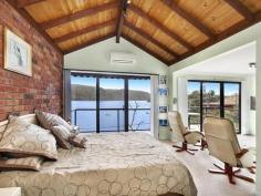 10 Milloo Parade Mooney Mooney NSW 2083 Live a Holiday Lifestyle Everyday, Just 30 Minutes from the North Shore. Presenting a truly unique offering, that is seldom available in this tightly held river front enclave. This immaculately presented waterfront property is desirably positioned in Cheero Point directly overlooking the river with views across to the picturesque mountains of the Brisbane Water National Park. Peace & privacy can be yours in this contemporary, split level home that comprises of 4 bedrooms and a stylish main bathroom. The stunning main bedroom suite is complete with its own media room and bathroom. The open plan living and dining areas perfectly capture the river vista and flow effortlessly outdoors to the entertainment deck. The property is easily accessable, offers double garaging plus storage, and even a place to tie up your boat. Council rates (approx) $ 2,411 per year. Inspection By Appointment. Please call Andrew Macdonald M# 0415 433 957