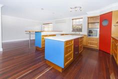 12 Bhowani Pl Kuraby QLD 4112 $799,000 Price Reduced for Immediate Sale* Open Saturday from 11am to 11:30am Situated in the popular suburb of Kuraby, perched high above the clouds rests this 3 storey castle in Kuraby. As it is one of the most unique houses I have ever had the pleasure of walking through in 8 years of selling houses in Kuraby, I am humbled to present this magnificent property to you. Situated on 715m2 of real estate gold, this double brick home is unique in almost every aspect. From its hardwood timber floors to its large and opulent living areas, what we are selling here today is definitely the lifestyle. The wrap around balcony gives you the most amazing views from your front door and the 30 metre bore hole gives you and your household an unlimited supply of fresh natural water without having to pay for it. The yard will be the first thing that catches your eye. Large, lush and spacious . You can almost envision yourself working the BBQ, the sizzling sound of that rib eye fillet you have been eyeing at the local butcher, the sound of your children kicking around the footy. Upstairs boasts 4 large bedrooms. All with their own built in robes and 3 large bathrooms. Because you are positioned so high up, the breezes come to you, so if you want to be that "one in a million" family that has the most well built and well designed house in your suburb, then come and visit us at the Open house this Saturday Featuring: 4 Large bedrooms plus 2 x studies 3 Bathrooms (including ensuite) 2 Car Garage First Level: Double Remote Garage Study Room Large Workshop Area Second Level Formal Living Area with Fireplace Study Laundry (connected with a laundry chute from the 3rd level) Open Plan Kitchen Family Area Rumpus Room (big enough for a pool table) Games Room Outdoor Patio area Bathroom Third Level 4 Bedrooms 2 Bathrooms (including Ensuite) Family Living Area Unique Features of the house Own Water Supply with 30metre bore hole Spotted Gum timber floors throughout Fire Place with Sandstone Floor Built in BBQ Ethernet Cabled throughout Electronic Watering System Solar Hot Water System A copy of the building and pest inspection is available on request Features Property ID 12841833 Land Size 715 Square Mtr approx. Building Size 406 Square Mtr approx. Air Conditioning Built In Robes Courtyard Dishwasher Floorboards Fully Fenced Outdoor Ent Remote Garage Rumpus Room Split System Study Workshop