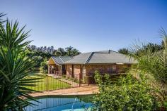 28A Lerra Rd Windella NSW 2320 Offers over $695,000 Set privately amid beautifully established gardens, this generously scaled home provides effortless family living. Its secluded position belies its central location, which is a short drive to Rutherford and Maitland shopping precincts and only 35min to Newcastle via new link road. Situated on a tree studded, 5400m2 block at Windella, this stunning architect designed home is impressive, spacious, cleverly designed, built to the highest quality and attention to detail. A formal entry leads to the sunken formal lounge on one side and the living room on the other which extends to a dining area opposite. Central to these is the impressive kitchen, with deep walk in pantry, dishwasher, stunning granite bench top, and island bench with new stainless steel cooking appliances. Quality features include ironbark hardwood floors, high ceilings, air- conditioning and wood fires. All bedrooms have built in robes, fans, 2 rooms with French doors to surrounding veranda’s, the master bedroom has large walk in robe. Abundant internal storage space. The rear garden has an opulent pool area, covered entertaining areas, large cubby house and double garage. This property is surrounded by established and low maintenance grounds and gardens which have full reticulation. The added bonus is the 30 metre train carriage (complete with 3 Phase power and water connection) situated in the rear of the block; presently used for quest accommodation and art studio, this has endless possibilities. Features Elegant formal lounge and dining areas Tranquil alfresco entertaining areas and wide verandas Established lawns and enticing pool areas Gourmet kitchen with quality appliances and walk in pantry Guest quarters has queen size bedrooms and private bathroom Parents wing is appointed with walk-in in robe and 2 way bathroom with spa Air-conditioning, cosy fireplaces and high ceilings Conveniently located near schools and only short drive to Maitland shopping precincts Bonus Train Carriage Presently used for quest accommodation and art studio