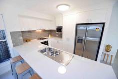 6 Aurora Road Tannum Sands Qld 4680 $315,000 Property ID 31373 Brand new and never lived in - PRDnationwide Gladstone is proud to present to the market 6 Aurora Road, Tannum Sands. Located in Tannum Blue estate just minutes to Tannum town centre, tavern and patrol beaches, this is a perfect starter home or investment property. Three spacious bedrooms all with ceiling fans and sliding wardrobes - the master with ensuite and walk in robe. Down the hall the bathroom has been designed for functionality including separate shower and bath beautifully finished with large mirror and vanity. Open plan lounge, dining and kitchen has plenty of windows to allow for breezes all year round the split system air conditioning in this space a bonus. The kitchen has been fitted with stainless steel gas cooktop, electric oven and a large breakfast bar. Generous sized dining area with sliding door access to the tiled outdoor entertainment area there is access via the dining or living area - the large doors allow for plenty of natural light. Fully fenced courtyard garden with low maintenance advanced tropical landscaping. 3KW solar panels and a smart energy home system added to security screens, solar tinted doors and windows and custom made blinds throughout also ensures plenty of extras in the price. Combined garage and tiled laundry area - it is surprisingly spacious. Vendors offering a guaranteed 7% gross income for 12 months to utilise this fantastic G and D Lawrie build as a display home. Land area 0.03HaAir Conditioning