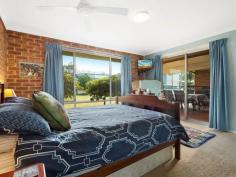 87 Bay St Tathra NSW 2550 $477,000 This home is the big entertainer boasting a huge front top deck, views, gourmet kitchen with gas double oven for the chef in all of us and an over-sized family room to fit even the largest family. The master bedroom has ensuite, walk in robe plus direct access to a second covered rear entertaining deck. Light filled all day long, sea breezes, 3 more bedrooms all with built-ins, a study/utility room and level, low maintenance secure yard makes this the perfect family home. It also has a garage for 4 cars or even the boat and workshop area that would see this space certainly cause 'man cave' envy. With sporting oval, public school and Kianinny Bay all nearby. If it's about family, entertaining & lifestyle then this is the property for you ! PROPERTY DETAILS Property Id: 61470250 Land Size: 809 Metres² Available: March 31, 2015