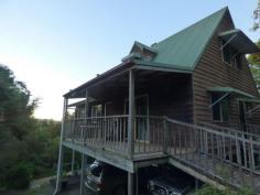 42 Elizabeth St Imbil QLD 4570 $375,000 Hidden Retreat House - Property ID: 785268 This gorgeous hidden cottage is set back from the road and located in a very private and quiet cul-de-sac in the beautiful town of Imbil. Situated on a very large 1.08ha 2 acres and totally private from the outside world. If you are looking at that perfect rural tree change but still need to be within 20 minutes to a major town, than look no further. Within only 20 minutes to Gympie, walking distance to the local shopping precinct and only 45 minutes to the glorious Noosa Main Beach this well maintained 2 story cottage simply awaits it's new owner. This high-set timber home offers 3 bedrooms, two bathrooms, 2 main living areas and a central kitchen with polished timber floors and a large balcony to capture the glorious views and cool breezes. Located within a fabulous community with lovely neighbors, it is with great hesitancy that this loving owner must relocate. This massive 10,800m2 parcel of land offers space for vegie gardens, a pool, running space and nature at is best. Under the house offers ample car space with sealed bitumen and plenty of room to build in a teenager retreat or games room, and don't forget the double steel frame shed for all the toys. This property is also on town water and is sewered which is fantastic for this area. To arrange a private inspection today, please call Kristy Simi 0414 409 139 or email kristy.simi@professionals.com.au
