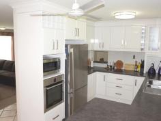 2 Andrew Ct Boyne Island QLD 4680 $470,000 NEG Excellent Home With Room To Park the Caravan. If you love to entertain or enjoy outside living this property is for you. This beautifully presented spacious 3 bedroom home is located on a level 781sqm corner allotment and offers a large undercover entertainment area with a sparkling saltwater in ground pool. The home is surrounded by a low maintenance yard with a large carport ideal for a caravan/boat. Situated only a short stroll to the Boyne River with easy access to all amenities and schools, this property is worth your time and will surprise you. Neutral colour tones decorates this lovely home throughout. Spacious is not the only feature of this well presented home, it boasts: *Large air-conditioned main bedroom with a resort style ensuite and built-in wardrobe. *Generous size bedrooms is with built-ins and ceiling fans, 1 bedroom is air conditioned. *A surprising large air-conditioned family room with a separate dining room. *Well-appointed kitchen with plenty of storage, bench space and stainless steel appliances. *Living/dining area of the kitchen opens up to a lovely large undercover entertainment area. *A large internal laundry with plenty of cupboard space and access to the outside. *The main bathroom features a shower bath and separate toilet. *Low maintenance yard with in ground salt water pool with pool equipment & pool cover *Large undercover entertainment area with a carport ideal for a boat or caravan. *Garden shed for storage. This property is ready for new owners to settle in and enjoy a coastal lifestyle. Golf, fishing and magnificent waterways near-by completes the picture. Don't wait call me today on 0408 738 767 to book your inspection. Property Snapshot Property Type: House Construction: Brick Veneer Land Area: 781 m2 Features: Built-In-Robes Dining Room Dishwasher Ensuite Established Gardens Family Room Fenced Back Yard Garden Shed In-Ground Pool Lounge Outdoor Living Read more at http://tannumsands.ljhooker.com.au/AKBFKE/2-andrew-court-boyne-island#XdO6UkDBerKOUGJY.99