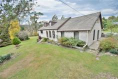 13369 Highland Lakes Rd Golden Valley TAS 7304 $335,000 - $355,000 Property Information A true wish list property for the discerning rural lifestyle property buyer. Just a mere 10 minutes drive from the vibrant township of Deloraine in Tasmania's northern heart, and located in one our most sought after locations in Golden valley. This impressive double storey, rendered brick home set well back from the road in a superbly private setting, with the awesome "Quamby Bluff" displaying a magnificent backdrop behind you, is just divine. Offering some 26 building squares of comfortable living on two levels, this home is a lifestyle retreat with no equal in its "For Sale" price bracket, and has a charm and ambience hard to find in any range or offering in the magical Meander valley. On offer is ground level living comprising 3 generous bedrooms with built in robes, full bathroom with room to move, open plan kitchen, dining and informal living combination, study nook, big laundry with exterior access, large formal lounge room with classy open fire that opens onto a generous undercover deck, perfectly positioned to soak up that winter sunshine. A large electric space heater in the occasional living room and "in floor heating", keep the home toasty and warm. Complimenting the Spanish / Mediterranean feel of the home is a lovely tiled veranda / front entry area that sings out "welcome" to all your guests. The upper level is a true parent's retreat, with a huge master bedroom and ensuite combination, private, warm, and with an air of relaxed living creating a perfect atmosphere. Also on this level is a huge rumpus / games room, or what ever you may desire, spread yourself out and enjoy the space. The private, north facing setting is a standout. Rich soils and fertile valley flats that should produce an abundance of produce from your 3.28 hectares, (8.1 acres) of land. Water is well catered for with a large underground tank, sizable property storage dam, and a small creek that touches on the eastern boundary of the holding for a short distance. An enclosed car shed takes care of your domestic transport, and a couple of garden sheds keep your maintenance tools tidy, and the landscaping and fencing are all in good order. Been searching for that Tasmanian lifestyle escape property? Please add this property at 13369 Highland Lakes road to your short list, you will be glad you did. Floor Area 26 squares Land Size 3.28 Ha Tenure Freehold Property condition Excellent Property Type Land, Acreage/semi rural, House Garaging / carparking Enclosed carport Construction Render and Brick veneer Joinery Aluminium Roof Tile and Concrete Insulation Ceiling Walls / Interior Brick, Gyprock Flooring Tiles and Carpet Window coverings Drapes, Curtains Heating / Cooling Woodfire (Open), Electric, Other (Under floor) Chattels remaining Blinds, Drapes, Fixed floor coverings, Light fittings, Stove, TV aerial, Curtains Kitchen Standard, Separate, Upright stove, Breakfast bar and Finished in Timber and Laminate Living area Formal lounge Main bedroom King and Built-in-robe Ensuite Separate shower Bedroom 2 Double and Built-in / wardrobe Bedroom 3 Double and Built-in / wardrobe Bedroom 4 Double and Built-in / wardrobe Additional rooms Rumpus Main bathroom Bath, Separate shower, Heater, Additional bathrooms Laundry Separate Views Rural Aspect North Outdoor living Garden, Deck / patio, Verandah Fencing Fully fenced Land contour Flat to sloping Grounds Manicured, Backyard access Garden Garden shed Water heating Electric Water supply Tank (size: Tank Dam and Creek) Sewerage Septic