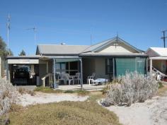 31 Otago Rd North Beach SA 5556 $655,000 GOING OVERSEAS-OWNER SAYS MUST SELL House - Property ID: 619630 VENDOR SAYS DROP $5000 A MONTH UNTIL SOLD Anyone one that holidays in Wallaroo would love to own this absolute beachfront property. It offers a great holiday home for your family & friends but also currently has a great return as a holiday rental sleeping 8 if you want to share this property. The property is low maintenance offering 2 bedrooms, polished floor boards, good kitchen & large open living lounge that leads to the veranda with the views some people can only dream of. To complete the experience this also offers a boat shed & carport with roller doors. Please call to arrange an inspection as there are only a few opportunities to view between holiday bookings. Just imagine having a front row seat of this magnificent beach from your own property! Owner says he can't take the Jet Ski with him so is included FREE with the sale.