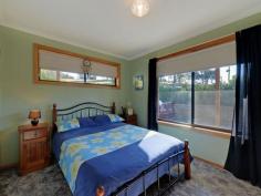 595 Native Corners Rd Campania TAS 7026 $365,000+ Charming Country Living With winter on the way, are you looking for a cosy country home where you can snuggle in front of the fire? You'll love coming home to your own sweet rural retreat. Only 35 minutes from Hobart and set on about 5 1/2 acres of low maintenance cleared land, this lovingly maintained home is perfect for the homebuyer who longs to get away from it all without breaking the budget. This home has a welcoming feel to it that makes you want to linger. Upon entering, you'll notice the wood heater in the lounge has been placed against an inside wall, ensuring it heats the whole house. Attractive windowed doors with decorative glass can be closed to separate the two living areas. The main lounge window looks out onto the nearby hills and valleys that are so flawless it is like having a beautiful painting on your wall. The kitchen inspires visions of home cooked meals, mouth-watering casseroles and roasts. There is lots of pantry space and a kitchen island for extra bench space. A bay window in the generous dining area adds charm and gives a resplendent view of the hills and yard, complete with adorable gazebo, swaddled in fragrant geranium. Toward the back of the house is the bathroom and with its deep tub and decorative glass window you are sure to be enticed into many a relaxing bubble bath. The laundry is practical and functional with good cupboard space. Surprisingly spacious yet still having an intimate feel, this home has been cleverly designed to have separation between the master bedroom and the other sleeping quarters, ideal for families who appreciate their own space and privacy. Two cosy bedrooms are at one end of the hall and get good sun. Both have built in robes. The inviting master bedroom at the far end of the hall is much larger and has a sizeable built in robe plus views from the generously size window. You can lie in bed and take in the scenery upon waking. The property also has a large colourbond workshop/garage, raised garden beds out the back for growing your own vegies, a garden shed plus three huge water tanks. Further up the hill is a barn/woodshed. To complete this idyllic country home, a covered Verandah runs all the way around the house, with a deck placed off the second living area. This area is perfect for outdoor entertaining with friends on warm summer evenings or a place to cosy up with a loved one, share a bottle of wine and marvel at the stars. Underneath the deck is a storage area. By the way, this house with its sunny aspect and inviting feel will draw all your friends in and it is likely you will have friends and family dropping by all the time. It's just that kind of place. Call Aaron or Helen now to secure your private inspection time. Property Snapshot Property Type: House Aspect Views: Mountain Construction: Brick House Size: 147.00 m2 Land Area: 5.50 acres Features: Built-In-Robes Decking Gazebo Heatpump Rumpus Room