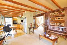 13369 Highland Lakes Rd Golden Valley TAS 7304 $335,000 - $355,000 Property Information A true wish list property for the discerning rural lifestyle property buyer. Just a mere 10 minutes drive from the vibrant township of Deloraine in Tasmania's northern heart, and located in one our most sought after locations in Golden valley. This impressive double storey, rendered brick home set well back from the road in a superbly private setting, with the awesome "Quamby Bluff" displaying a magnificent backdrop behind you, is just divine. Offering some 26 building squares of comfortable living on two levels, this home is a lifestyle retreat with no equal in its "For Sale" price bracket, and has a charm and ambience hard to find in any range or offering in the magical Meander valley. On offer is ground level living comprising 3 generous bedrooms with built in robes, full bathroom with room to move, open plan kitchen, dining and informal living combination, study nook, big laundry with exterior access, large formal lounge room with classy open fire that opens onto a generous undercover deck, perfectly positioned to soak up that winter sunshine. A large electric space heater in the occasional living room and "in floor heating", keep the home toasty and warm. Complimenting the Spanish / Mediterranean feel of the home is a lovely tiled veranda / front entry area that sings out "welcome" to all your guests. The upper level is a true parent's retreat, with a huge master bedroom and ensuite combination, private, warm, and with an air of relaxed living creating a perfect atmosphere. Also on this level is a huge rumpus / games room, or what ever you may desire, spread yourself out and enjoy the space. The private, north facing setting is a standout. Rich soils and fertile valley flats that should produce an abundance of produce from your 3.28 hectares, (8.1 acres) of land. Water is well catered for with a large underground tank, sizable property storage dam, and a small creek that touches on the eastern boundary of the holding for a short distance. An enclosed car shed takes care of your domestic transport, and a couple of garden sheds keep your maintenance tools tidy, and the landscaping and fencing are all in good order. Been searching for that Tasmanian lifestyle escape property? Please add this property at 13369 Highland Lakes road to your short list, you will be glad you did. Floor Area 26 squares Land Size 3.28 Ha Tenure Freehold Property condition Excellent Property Type Land, Acreage/semi rural, House Garaging / carparking Enclosed carport Construction Render and Brick veneer Joinery Aluminium Roof Tile and Concrete Insulation Ceiling Walls / Interior Brick, Gyprock Flooring Tiles and Carpet Window coverings Drapes, Curtains Heating / Cooling Woodfire (Open), Electric, Other (Under floor) Chattels remaining Blinds, Drapes, Fixed floor coverings, Light fittings, Stove, TV aerial, Curtains Kitchen Standard, Separate, Upright stove, Breakfast bar and Finished in Timber and Laminate Living area Formal lounge Main bedroom King and Built-in-robe Ensuite Separate shower Bedroom 2 Double and Built-in / wardrobe Bedroom 3 Double and Built-in / wardrobe Bedroom 4 Double and Built-in / wardrobe Additional rooms Rumpus Main bathroom Bath, Separate shower, Heater, Additional bathrooms Laundry Separate Views Rural Aspect North Outdoor living Garden, Deck / patio, Verandah Fencing Fully fenced Land contour Flat to sloping Grounds Manicured, Backyard access Garden Garden shed Water heating Electric Water supply Tank (size: Tank Dam and Creek) Sewerage Septic