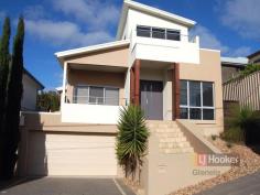 11 Barton Ave Marino SA 5049 $830,000 - $860,000 Sunsets and Sea Views - The Ultimate Beachside Lifestyle! OPEN THIS SATURDAY 13TH & SUNDAY 14TH JUNE FROM 3:30 - 4:00PM This modern and imposing home will appeal to even the most discerning buyers. Set over 3 levels it offers generous living accommodation and the finest quality fittings and fixtures. The ground level features a large double garage with good storage under the stairs and there is also further storage under the house, perfect for the wine collector! The first floor living area is enormous in size, with stunning high gloss porcelain floor tiles. Entertain on the front balcony all year round while enjoying the cool sea breezes in the evening. The kitchen is beautifully appointed with stone bench tops and stainless steel appliances including dishwasher for easy clean up. The rear courtyard is low maintenance and the expansive timber deck provides a private place to fire up the BBQ or relax with family and friends. Bedrooms 2 & 3 are spacious in size with built in robes and are serviced by the main bathroom. The master bedroom takes pride of place on the top floor with its own private balcony enjoying panoramic sea views. A large walk in wardrobe has room for the biggest of fashion collections and the luxurious ensuite features a couples shower and corner spa bath to soak away the day's worries. Situated in this quiet residential enclave with local parks nearby, walk to the train station for an easy commute to the CBD and enjoy a morning coffee at the beach kiosk before strolling along the pristine white sands. The ultimate beachside lifestyle awaits one lucky buyer, make sure it's you! Property Details Council: City of Holdfast Bay House Size: 213sqm (approx) Land Size: 305sqm Year Built: 2008 For further information please contact Jarad Henry. Visit www.glenelgpropertyguide.com.au to view other LJ Hooker Glenelg listings. RLA 182909 Property Snapshot Property Type: House Construction: Rendered Zoning: R - Residential Features: Decking Area Dishwasher Fenced Lock Up Garage Outdoor Entertainment Area