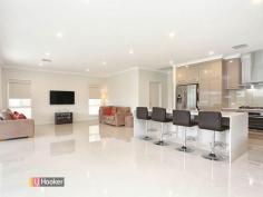 77 The Blvd Parafield Gardens SA 5107 $485,000 - $495,000 OPEN: Saturday 13th June 1245-115 Pm. SPECTACULAR LUXURY LIVING A sensational feeling is upon you when entering this meticulously built modern home, This one year young 'Distinctive Homes' built property proudly located within 'The Boulevard' provision of Parafield Gardens is designed to accommodate an ever growing family. Highlight features on offer include a sizable master bedroom featuring a walk through his and her robe and vast ensuite featuring a dual double length shower, double vanity and floor to ceiling quality tiling. Bedrooms two and three are both of size and includes floor to ceiling mirrored built in robes, whilst bedroom four and the additional study would make fantastic use as a home office and/or teenager living room. Servicing the remaining bedrooms is the properties second bathroom, featuring a full length shower and handy separate water closet. An amazing kitchen is also what makes this property even more special! Highlight kitchen features are; - Vast 'Caesar Stone' bench tops and ample overhead cupboard space - Top of the range stainless steel 'Westinghouse' appliances including dishwasher, one 900 ml oven and gas cooktop and another 600 ml wall mounted oven and a fully ducted range hood - Incredible integrated walk in pantry with floor to ceiling storage options - A breakfast bar - A double fridge space with plumbed in water for fridge - Soft closing drawers, amongst other features. Adjacent to the kitchen is the large open plan living and dining room. Through the retractable sliding doors outside and you will be greeted with the alfresco entertaining area, complete with surrounding pull down screens, a gas outlet and water plumbing for possible installation of a kitchen and wall mounted TV. The pretty green lawn area would make the perfect space for the kids and/or family pet to have a run around! Further notable features include a double automatic panel lift garage with external rear access, 60 by 60 Porcelain tiles in all main living and entry areas, a monitored alarm system, a 12.5 kw reverse cycle ducted air conditioning with zone control, hallway storage and a large functional laundry. Please Contact Agent For Further Details. RLA 235 270. Property Snapshot Property Type: House