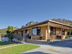 595 Native Corners Rd Campania TAS 7026 $365,000+ Charming Country Living With winter on the way, are you looking for a cosy country home where you can snuggle in front of the fire? You'll love coming home to your own sweet rural retreat. Only 35 minutes from Hobart and set on about 5 1/2 acres of low maintenance cleared land, this lovingly maintained home is perfect for the homebuyer who longs to get away from it all without breaking the budget. This home has a welcoming feel to it that makes you want to linger. Upon entering, you'll notice the wood heater in the lounge has been placed against an inside wall, ensuring it heats the whole house. Attractive windowed doors with decorative glass can be closed to separate the two living areas. The main lounge window looks out onto the nearby hills and valleys that are so flawless it is like having a beautiful painting on your wall. The kitchen inspires visions of home cooked meals, mouth-watering casseroles and roasts. There is lots of pantry space and a kitchen island for extra bench space. A bay window in the generous dining area adds charm and gives a resplendent view of the hills and yard, complete with adorable gazebo, swaddled in fragrant geranium. Toward the back of the house is the bathroom and with its deep tub and decorative glass window you are sure to be enticed into many a relaxing bubble bath. The laundry is practical and functional with good cupboard space. Surprisingly spacious yet still having an intimate feel, this home has been cleverly designed to have separation between the master bedroom and the other sleeping quarters, ideal for families who appreciate their own space and privacy. Two cosy bedrooms are at one end of the hall and get good sun. Both have built in robes. The inviting master bedroom at the far end of the hall is much larger and has a sizeable built in robe plus views from the generously size window. You can lie in bed and take in the scenery upon waking. The property also has a large colourbond workshop/garage, raised garden beds out the back for growing your own vegies, a garden shed plus three huge water tanks. Further up the hill is a barn/woodshed. To complete this idyllic country home, a covered Verandah runs all the way around the house, with a deck placed off the second living area. This area is perfect for outdoor entertaining with friends on warm summer evenings or a place to cosy up with a loved one, share a bottle of wine and marvel at the stars. Underneath the deck is a storage area. By the way, this house with its sunny aspect and inviting feel will draw all your friends in and it is likely you will have friends and family dropping by all the time. It's just that kind of place. Call Aaron or Helen now to secure your private inspection time. Property Snapshot Property Type: House Aspect Views: Mountain Construction: Brick House Size: 147.00 m2 Land Area: 5.50 acres Features: Built-In-Robes Decking Gazebo Heatpump Rumpus Room