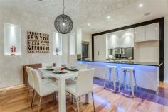 17A Riverside Drive Felixstow SA 5070 $895,000 - $960,000 Property Information Open Home Dates: Saturday 13 Jun 12:00 PM - 12:40 PM Sunday 14 Jun 12:00 PM - 12:40 PM Linear Park frontage, Brand New & Stunning This architecturally designed prestige home overlooks the picturesque Torrens River Linear Park with uninterrupted leafy outlooks, abundant birdlife and resident koalas. Ideally located less than 5km from Rundle Street, 4km to Norwood Parade and less than 6km to the City centre, this has to be one of the finest brand new homes to hit the market this year. Superbly appointed with generous accommodation and impressive attention to detail, this home is jam packed with modern day luxuries and up to the minute technology. - 3 living areas - downstairs, upstairs and outdoors with decked alfresco under the main roof complete with sundeck - 4 large bedrooms, plus a study or sitting room with views of Linear Park - 3 full bathrooms, tiled to the ceilings with hot water controllers and heated towel rails - main bedroom suite with sensational views over Linear Park, his and hers walk in robes, ensuite bathroom with double oversized shower, double basins, luxurious spa, heated towel rails, bathroom audio and feature lighting - upstairs living area with stunning balcony overlooking Linear Park - 3 double bedrooms located upstairs with fourth guest bedroom downstairs with its own full bathroom and built in robe - all bedrooms have floor to ceiling custom built in robes - designer kitchen with crisp white 2 pac cabinetry, walk in pantry, stainless steel appliances, smoked glass splashbacks and shimmering black granite bench tops - 3 metre ceilings downstairs and 2.7m upstairs - stacker doors open onto the undercover alfresco deck for all weather entertaining - irrigated landscaped low maintenance gardens and lawns with automatic watering system - double garage with high clearance full width panel door, automatic lighting, integrated storage area, very handy utility sink, external and internal access doors - integrated alarm system with remote front door lock (no hands!) and recordable intercom camera - Daiken reverse cycle air-conditioning with 6 zones and dual upstairs, downstairs zone controllers - custom room to room audio with smartphone function, extensive data cabling throughout the house including data and Foxtel to all TV's, bedrooms and living areas - Clipsal central home data and audio hub with built in surround sound cabling to main living areas - abundant storage with 3 upstairs linen cupboards, downstairs built in linen cupboard and additional integrated under stair, garage and laundry storage areas - upstairs laundry chute - feature ceilings and display niche's with custom led lighting Unparalleled location overlooking Torrens Linear Park the largest hills-to-coast park in Australia. With 30km of bike and walking trails extending from the hills through to the Adelaide Botanical Gardens, Adelaide Zoo, Elder Park and all the way to the river mouth at Henley Beach. Par 3 Geoff Heath Golf Course is straight out your front door with the clubs, a short stroll through the park and onto the golf course. Multiple playground areas for the kids and a short walk along the trails to the Lochiel Park Wetlands and recreation area or the soon to be constructed Felixstow Reserve Wetlands featuring a boardwalk, fitness area and wildlife haven. Nature abounds with a kaleidoscope of flora and fauna. Koalas in the trees, hand feed the ducks or view a stunning array of natural birdlife. Want to travel into the city, forget the car. Walk through the park and across the river footbridge to the O-Bahn Interchange less than two minutes away. Travel directly into the city in fewer than 8 minutes and less than half that time with the recently announced O-Bahn upgrade! Helpful info ... C/T Reference: Volume: 6146 Folio: 638 Council: Norwood Payneham St Peters 3 Zoning: R2A - Residential 2A Year Built: 2013 approx. Land Size: 389sqm approx. Council Rates: $tba pa approx. ESLevy: $tba pa approx. Water (supply only): $tba pq approx. Sewer (supply only): $tba pq approx. Floor Area 310 sqm Approx year built 2015 Property condition New Property Type House House style Contemporary Garaging / carparking Internal access, Double lock-up, Auto doors Construction Brick veneer Roof Colour bond Insulation Walls, Ceiling Flooring Timber and Carpet Window coverings Blinds Heating / Cooling Reverse cycle a/c, Ducted, Ceiling fans Electrical TV points, Smart wiring Property features Security system, Safety switch, Smoke alarms, Intercom Kitchen Designer, Modern, Open plan, Dishwasher, Separate cooktop, Separate oven, Rangehood, Double sink, Gas reticulated, Pantry and Finished in Granite and Other (2 pac cabinetry) Living area Formal lounge, Open plan Main bedroom Double, Walk-in-robe and Heating / air conditioning Ensuite Separate shower, Spa bath Bedroom 2 Double, Built-in / wardrobe and Heating / air conditioning Bedroom 3 Double, Built-in / wardrobe and Heating / air conditioning Bedroom 4 Double, Built-in / wardrobe and Heating / air conditioning Additional rooms Family, Office / study Main bathroom Bath, Separate shower, Exhaust fan, Heater Laundry Separate Views Park Aspect North, South Outdoor living Entertainment area (Covered), Garden, BBQ area (with lighting and with power), Deck / patio Fencing Fully fenced Land contour Flat Grounds Landscaped / designer Water heating Gas Water supply Mains Sewerage Mains Locality Close to transport, Close to schools, Close to shops