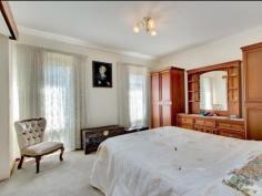 8 Jacob St Marion SA 5043 $1,450,000 to $1,500,000 IRRESISTIBLY STUNNING, AMAZINGLY BEAUTIFUL – WAIT TILL YOU SEE…… Inspection Times: Sat 06/06/2015 12:30 PM to 01:15 PM Introducing a beautifully presented, solid brick and versatile family home that has a warm, neutral palette and all on an approx. 780 m2 of land. Only five houses from the esplanade, close to great schools and a genuine brief stroll to the beach, Somerton yacht and surf lifesaving club, a home offering this space, all on single level, in this location, will be hard to look past. This home offers three wet areas, two entertaining areas and a 'true' double garage and driveway. It comes with four bedrooms, three with built in robes that have internal draws and shelves. The generous Master suite comes with WIR/Ensuite and can accommodate your king sized bed, plus more. The laundry is definite family size, as is the main bathroom which includes ceasarstone bench tops, high quality fittings and beautiful Italian glass feature lighting. The main family room is huge, bright and open and includes extensive custom shelving and TV unit, and is positioned centrally to service both the courtyard and back veranda entertaining areas. It overlooks a sunny north facing back yard which is great as is but also has plenty of room for a pool at a later date. The courtyard is a large and versatile area either allowing an extra vehicle to be brought through or acting as an awesome entertaining space for larger gatherings. It is finished in trendy and practical polished concrete and comes complete with pots, plants and table. The kitchen features a stunning hand painted splash back and huge 4.2 metre long Caesar stone central bench top. A well equipped kitchen which includes a high end Gessi retractable tap, water filter, Insinkerator, a 690 litre double door and fully plumbed fridge, Smeg 90cm induction cook top, Smeg oven and dishwasher. An added bonus is the spacious and discreet walk in pantry with a butler's sink, stainless steel shelving and extra valuable work space. This home offers year round comfort with ducted reverse cycle air conditioning, a cosy gas log fire place in formal lounge, ceiling fans and tasteful practical window treatments throughout, as well as, external north facing automated sun blinds plus energy efficient comfort glass windows on all north side of home. No shortage of storage space with an abundance of built in cupboards inside and a large good old fashioned sized service yard outside. The home is very secure providing off-road parking for over four vehicles, an automated front gate with keypad entry, intercom, camera, and alarm system. An attractive and practical home surrounded by established manicured gardens serviced automated watering system.
