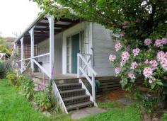 92-94 Batchelor Street Queenstown TAS 7467 $99,000 Property Information Owner is willing to lease back at an 8.4% rental yield. Perfect tenants to look after your investment.Three Bedroom and study and two living areas. Large lounge opening up to front balcony. Open plan kitchen, dining and lounge with electric heating. Kitchen has lots of cupboard space and dishwasher. Separate sitting room with wood fired heating. Master bedroom with walk in robe. Bathroom with shower. Garage has plenty of workshop and storage space. Carport and fully fenced. Call to discuss further or to organise your inspection. Floor Area 118.4 sqm Land Size 1385 sqm Property condition Good Property Type House House style Bungalow Garaging / carparking Single lock-up, Open carport, Off street Walls / Interior Panel sheeting Flooring Other (Vinyl) and Carpet Window coverings Drapes Heating / Cooling Woodfire (Closed), Electric Chattels remaining Wood Fire, Blinds, Drapes, Fixed floor coverings, Light fittings, Stove, TV aerial, Curtains Kitchen Modern, Open plan, Dishwasher and Rangehood Living area Open plan Main bedroom King and Walk-in-robe Bedroom 2 Double Bedroom 3 Single Main bathroom Separate shower Laundry Separate Workshop Combined Views Urban Outdoor living Deck / patio Fencing Fully fenced Land contour Flat to sloping Grounds Tidy Water heating Electric Water supply Town supply Sewerage Mains Locality Close to schools, Close to shops