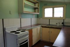 60-62 Esplanade Queenstown TAS 7467 $35,000 Property Information Cottage on two blocks. Just what the renovator is looking for. Some of the hard work is done. Lounge has pure heat wall heater for warmth while renovating. Kitchen complete with stove. Bathroom has been renovated with tiled floor, new shower, vanity and ceiling heating. New toilet. Some of the new cladding has been done but plenty of scope to add your own touch. Great workshop with character which will come in handy for storing tools for the renovation. Spare block of 376sqm for gardens or chooks. With some hard work you could own your very own. Call to discuss further or to organise inspection. Land Size 610 sqm Property condition Renovator Property Type House House style Cottage Garaging / carparking Off street Construction Timber and Cladding Joinery Timber Roof Iron Walls / Interior Panel sheeting Flooring Carpet, Other (Vinyl) and Timber Window coverings Drapes Heating / Cooling Electric Chattels remaining Fixed floor coverings, Light fittings, Stove, Curtains Kitchen Original and Upright stove Living area Separate living, Separate dining Main bedroom Double Bedroom 2 Double Main bathroom Separate shower, Heater Laundry Separate Workshop Separate Views Urban Fencing Partial Land contour Flat Grounds Overgrown Water heating Electric Water supply Town supply Sewerage Mains Locality Close to shops, Close to schools