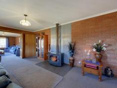 595 Native Corners Rd Campania TAS 7026 $365,000+ Charming Country Living With winter on the way, are you looking for a cosy country home where you can snuggle in front of the fire? You'll love coming home to your own sweet rural retreat. Only 35 minutes from Hobart and set on about 5 1/2 acres of low maintenance cleared land, this lovingly maintained home is perfect for the homebuyer who longs to get away from it all without breaking the budget. This home has a welcoming feel to it that makes you want to linger. Upon entering, you'll notice the wood heater in the lounge has been placed against an inside wall, ensuring it heats the whole house. Attractive windowed doors with decorative glass can be closed to separate the two living areas. The main lounge window looks out onto the nearby hills and valleys that are so flawless it is like having a beautiful painting on your wall. The kitchen inspires visions of home cooked meals, mouth-watering casseroles and roasts. There is lots of pantry space and a kitchen island for extra bench space. A bay window in the generous dining area adds charm and gives a resplendent view of the hills and yard, complete with adorable gazebo, swaddled in fragrant geranium. Toward the back of the house is the bathroom and with its deep tub and decorative glass window you are sure to be enticed into many a relaxing bubble bath. The laundry is practical and functional with good cupboard space. Surprisingly spacious yet still having an intimate feel, this home has been cleverly designed to have separation between the master bedroom and the other sleeping quarters, ideal for families who appreciate their own space and privacy. Two cosy bedrooms are at one end of the hall and get good sun. Both have built in robes. The inviting master bedroom at the far end of the hall is much larger and has a sizeable built in robe plus views from the generously size window. You can lie in bed and take in the scenery upon waking. The property also has a large colourbond workshop/garage, raised garden beds out the back for growing your own vegies, a garden shed plus three huge water tanks. Further up the hill is a barn/woodshed. To complete this idyllic country home, a covered Verandah runs all the way around the house, with a deck placed off the second living area. This area is perfect for outdoor entertaining with friends on warm summer evenings or a place to cosy up with a loved one, share a bottle of wine and marvel at the stars. Underneath the deck is a storage area. By the way, this house with its sunny aspect and inviting feel will draw all your friends in and it is likely you will have friends and family dropping by all the time. It's just that kind of place. Call Aaron or Helen now to secure your private inspection time. Property Snapshot Property Type: House Aspect Views: Mountain Construction: Brick House Size: 147.00 m2 Land Area: 5.50 acres Features: Built-In-Robes Decking Gazebo Heatpump Rumpus Room