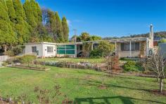 41/43 Crowther St Beaconsfield TAS 7270 $229,000 - $249,000 Property Information Originally built in 1966 as a Rectory this large home has been modernised throughout, boasting additions such as solar panels (a 3kw system), new guttering, new security window screens, relatively new kitchen, new dishwasher, new carpet in the living area etc. that now represents a great opportunity for families, entertainers, hobbyists etc. to secure a larger than average home complimented by generous fully fenced grounds, a double garage, a double carport (tall enough to house the average size boat), an undercover entertaining area and 3 garden sheds providing more than adequate outdoor storage. Meticulously maintained, the home is composed of generously proportioned rooms allowing for flexibility of use for bedrooms and living zones, combined with a real bonus being the 5th bedroom, kitchenette and second toilet set apart from the main house (subject to council approval this area could be converted to separate living quarters with very little work or simply use as is for guest accommodation, extended family, teenagers retreat, hobby space or the perfect office, particularly for those that work from home needing their own quiet space away from the residence). The main residence complete with ducted wood heating comprises a spacious entrance hall, 4 double/queen size bedrooms all with built in robes, bathroom including a bath and separate shower, modern kitchen incorporating ample bench and cupboard space, breakfast bar, dishwasher and a pantry, dining with lovely polished boards (overlooking the garden), light airy lounge, large laundry with built-in storage and finally via the undercover entertaining area to the separate kitchenette, 2nd toilet and king size 5th bedroom with built in shelving. A leisurely stroll through the 1618sqm corner allotment, reveals lovely established trees combined with a vast array of plantings for colour, plenty of space for the children to run and play with endless nooks and crannies for them to explore, safely fenced for pets, veggie garden with room for the keen gardener to expand if desired, multiple fruit trees, three storage sheds and a chicken run. Conveniently located within walking distance of local shopping, primary school, doctor, vet, chemist etc., approximately 30 minutes from Launceston and even closer to George Town, this property will hold appeal for commuters and locals alike. A drive by will not suffice, inspection is a must to fully appreciate all this affordable property has to offer. Call Kaylene Bushby now to arrange your viewing of a property that you will be proud to call home ! Floor Area 148 sqm Land Size 1618 sqm Tenure Freehold Approx year built 1966 Property condition Good Property Type House Garaging / carparking Double lock-up, Open carport, Off street, Free standing Construction Brick veneer Joinery Aluminium Roof Roof Decking Flooring Carpet, Polished and Other (Lino) Window coverings Drapes, Curtains Heating / Cooling Woodfire (Closed) Chattels remaining All Fixed Floor Coverings, All WIndow Furnishings, All Light Fittings, Insect Screens; Three Security (Screen) Doors, WIndow Security Screens, Three Garden Sheds, One Electrolux Chef Wall Oven, Hot Plates, One Range Hood, One Dishwasher, One Saxon In-Built Wood Heater and One Clothes Line. Kitchen Modern, Dishwasher, Separate cooktop, Separate oven, Rangehood, Breakfast bar and Pantry Living area Separate living, Separate dining Main bedroom Double and Built-in-robe Bedroom 2 Double and Built-in / wardrobe Bedroom 3 Double and Built-in / wardrobe Bedroom 4 Double and Built-in / wardrobe Extra bedrooms Double plus robe Main bathroom Bath, Separate shower Entrance Large Entrance Hall Laundry Separate Views Urban, Rural Outdoor living Entertainment area (Covered), Garden Fencing Fully fenced Land contour Flat to sloping Grounds Tidy, Backyard access Garden Garden shed (Number of sheds: 3) Water heating Electric Water supply Town supply Sewerage Mains Locality Close to shops, Close to schools