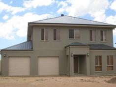 29 Errington St Wallaroo SA 5556 $650,000 - $680,000 TWICE THE NORMAL HOME House - Property ID: 691784 This is a quality built steel frame Weeks Peacock home that offers 2 levels that could be lived in separately. The lower level has stunning kitchen, only the best appliances and soft close drawers, large walk-in pantry with large meals and living area with sea views. The master bedroom has wir and ensuite that is more the size of a bathroom. Upstairs offers 4 more double bedrooms, linen press the size of a small bedroom, 3 way bathroom with double basin and its own kitchenette and a large entertaining deck to enjoy the sea views of Wallaroo Bay. The homes 3 WC's all have soft close lids, there are also 2 r/c ducted a/c units (1 for each level), security roller shutters, 2 banks of solar panels (9 KW), double garage UMR and 11m x 6m garage suitable for large boats. The garden is yours to create depending on how much maintenance you are looking for. This is a quality package that has to be inspected to be appreciated. Print Brochure Email Alerts Features 2 Levels, top with sea views Quality appliances 2 levels could be lived in separately Solar Panels 2 x Reverse cycle ducted air conditioners, one for each level