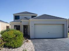 147 Excelsior Parade Hindmarsh Island SA 5214 $515,000 - $525,000 "Magic Marina" Lifestyle Living with an Awesome View! * This well presented 2-storey "Marina Mansion" offers superb/slightly elevated north facing lagoon views + a substantial 4 bedroom home with three bathrooms, two living areas (one up-one down) + a large wet bar/entertaining area up-stairs, x2 covered outdoor areas with multiple sliding doors providing easy access for groups of all ages. * Feature packed with a well proportioned kitchen includes combination gas/electric stainless appliances, hard wearing floor tiles & loads of cupboards + pantry for all your entertaining needs. Functional modern down lighting & multiple split system R/C air-conditioning keeps the home warm in winter & cool in summer noting the downstairs shower + W/C + laundry add a practicality for the diverse needs of many families. * Other features include up-stairs sleeping accommodation with 2 bedrooms plus supporting bathroom (with bath) plus a massive linen press, two downstairs bedrooms with the master boasting a generous walk-through robe to en-suite ideal for quiet mornings away from everyone and a monitored security system perfect for protecting your asset when away. * Positioned on a very low maintenance approx. 691m2 allotment with a fully paved/fenced side courtyard leading from the rear of the garage opening access down to the water, free standing 2-bay garage with auto lift doors & a substantial jetty mooring perfect for securing all kinds of water craft. Rear lawn plus watering system, retaining walls plus low maintenance garden make the home complete and ready to move into and enjoy. * Inspection at your convenience by calling Peter O'Brien on 0439 807 035 but don't hesitate, at this price this fantastic property won't last long! Property Snapshot Property Type: Duplex Aspect Views: Waterfront/ Jetty Construction: Brick Veneer Features: Balcony Rumpus Room Walk-In-Robes