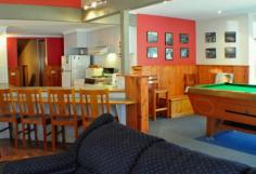 8 Geebung Road Dinner Plain VIC 3898 Owned by the same family for 26 years Crystal Brook Lodge fills you with a warm homely glow from the moment you step inside, a real home away from home.The lodge is configured to easily accommodate several families or small groups, making it ideal for personal or rental use. (currently configured to sleep 16 guests) Featuring the perfect entertaining space, with cosy lounge area, log burning fire and characterful pitched beamed ceilings, open plan kitchen and dining area, and even a pool room to send your prized possessions, or just hang out with family and friends. All this, plus newly refurbished luxury bathrooms, and an enormous spa pool to relax in after a awesome day, with a glass of gluhwein to sooth those aching limbs after a fun day on the slopes. Ground Floor, entertaining areas with pool room, open plan kitchen, two bedrooms one with a double and a set of bunks, the other with 2 sets of bunk beds. Separate toilet, laundry facilities, bathroom with spa pool, separate toilet and drying cupboard. Upstairs, Two bedrooms, one with a double bed and a set of bunks and the other with a double bed and 2 single beds. Hallway features clever storage areas for unpacking bags. Bathroom and toilet. Crystal Brook Lodge is in the rental pool and details in income and outgoings are available upon request.