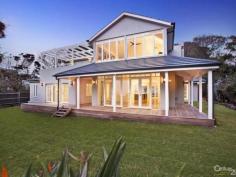 401 Beach Rd Beaumaris VIC 3193 Landmark Estate On High Above Ricketts Point Find World-Class architectural inspiration at Melbourne's pre-eminent clifftop location. Set high above Ricketts Point with a Beach Rd address and a Point Ave location, this breath-taking approx 13444sqft/1249sqm estate showcases Hamptons-inspired design in a unique beachfront location. Featuring five bedrooms, 3.5 bathrooms, dual studies and multiple living areas, this high-gabled home is oriented for bay-view al fresco living over two levels with French doors to sweeping verandas on the ground-floor and a pergola-shaded glass-edged balcony terrace up above. Designed for an entertaining lifestyle with traditional formal lounge facing the bay, the home steps back to offer family living and dining opening to sandstone-paving through north-facing bi-folds, while an additional rumpus room has its own northerly poolside garden access. Clever accommodating with suites upstairs and down, the home stars a spectacular first-floor master domain with individually-styled dual dressing-rooms and a vast ensuite, plus a hard-working study on each level. Appointed to an international standard of design and quality with custom-crafted marble kitchen, the home features individual detailed Travertine-tiled dual vanity bathrooms, solid-hardwood floors and gas and open-fireplaces. With reverse-cycle ducted heating and air-conditioning supplementing hydronic heating, the home is fully alarmed with video-intercom entry and beautiful bespoke cabinetry throughout. Corner-sited with panoramic bay-views to the front and a direct northerly rear aspect, the home is set vast landscaped grounds with sparkling pool and generous four car auto garage with store and mudroom access to the home. Set on high in a unique bushland setting, this is a landmark beachfront property with international influences and claim to two iconic addresses! PROPERTY DETAILS Contact Agent ID: 301727