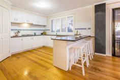 11 Spencer St Mt Martha VIC 3934 $795,000 Property Information Open Home Dates: Thursday 9 Jul 4:45 PM - 5:15 PM Saturday 11 Jul 11:30 AM - 12:00 PM To spend summer days lazing by the pool or witness spectacular sunsets over the bay from the broad balcony, this luxury five-bedroom residence provides a seemingly endless floorplan, grand proportions and all the joys of privileged beachside living. Set on a large 1,100 sq.m (approx) allotment behind a sweeping horseshoe driveway, the stunning contemporary home is finished with polished floorboards and white timber venetians throughout for a touch of beautiful coastal ambience, while three separate living zones and a seemingly endless floorplan gives incredible space for the busiest of families to spread out in style. Fabulous for entertaining, a stunning arched feature window adds an element of grandeur in the formal lounge and dining room, while the covered alfresco balcony provides wonderful space for summer dinner parties with views over the pool and across the bay to the You Yangs. A spacious family room and dining hall adjoin a well equipped appealing white kitchen with Bosch stainless steel dishwasher, while a large split level rumpus lounge on the lower level is fabulous space for children to spread out with a door to a poolside terrace, gardens and a cubby. Cleverly designed with all bedrooms on the lower level, an extra large master bedroom has a dressing room and a spa ensuite, ideal for a relaxing soak at the end of the day, while four other bedrooms share a sparkling family bathroom and powder room. Other features include ducted heating, airconditioning, internal access to a double remote-controlled garage with rear roller door access and separate driveway ideal for the boat between trips out onto the bay. Property condition Good Property Type House House style Contemporary Garaging / carparking Double lock-up, Auto doors Construction Brick veneer Walls / Interior Gyprock Flooring Carpet and Polished Window coverings Blinds (Timber) Heating / Cooling Split cycle a/c, Ducted Kitchen Standard, Dishwasher, Rangehood and Finished in Laminate Living area Open plan, Formal dining, Formal lounge Main bedroom King and Walk-in-robe Ensuite Spa bath, Separate shower Bedroom 2 Double and Built-in / wardrobe Bedroom 3 Double and Built-in / wardrobe Bedroom 4 Double and Built-in / wardrobe Bedroom 5 Double and Built-in / wardrobe Main bathroom Bath, Separate shower Laundry Separate Outdoor living Pool (Inground and Security fencing), Deck / patio Fencing Fully fenced Land contour Flat to sloping Grounds Tidy, Backyard access Water supply Town supply Sewerage Mains Locality Close to shops, Close to schools, Close to transport