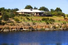 509 Hopkins Point Rd Allansford VIC 3277 $1,200,000 Country House with Enviable River Frontage - 38 Acres "River's Edge" features 38 productive acres with enviable riverside tranquillity and seclusion, offering lifestyle perfection and rare river splendour! The property features a five bedroom well styled country house with expansive Hopkins River Frontage boarding a delightful establish garden setting and all only minutes from Warrnambool's CBD - 9kms. The home seamlessly achieves the complete inside / outside living solution where river views and natural light are captured to perfection from three well styled living options. An extensive north facing open plan kitchen, dining and living room flows open to a wonderful semi enclosed outside entertaining area which steps down to a landscaped garden surround and overlooks the breathtaking Hopkins River to perfection. A sun filled and expansive living space to entertain family and friends. The well styled living/dining area is a welcoming and spacious family room complete with eye catching neutral tones, slow combustion wood heater for winter comfort and reverse cycle cooling for the summer months. French doors lead to a second living area which also captures relaxing river views and natural light. The two of the homes five bedrooms have feature windows framing extensive river views. The master bedroom captures enviable river vistas and has an excellent walk in robe and spacious en suite complete with spa. The home boasts many wonderful characters of a "Country House" including a large family sized kitchen with feature granite bench tops, generously sized walk in pantry and a huge laundry with wonderful storage. The garden surrounds are complete with an extensive lawn area gently undulating to the river side and are complete with built in trampoline and synthetic chip and golf green for the golfing enthusiast. "River's Edge" provides 38 productive and fertile acres well subdivided into 5 main paddocks all watered by bore and troughs. The farming improvements are substantial and include extensive shedding consisting of three main sheds; a fully enclosed GI Shed with concrete flooring and mezzanine floor 50m x 15m, second Open bay GI Shed of 15m x 7m and third shed for wood and chook house. Native plantations provide an excellent shelter belt for stock and a further 5 acres of lush dense bush land provides further shelter. An impressive and unique opportunity to purchase a sought after and enviable riverside property only minutes from Warrnambool's CBD. A stylish "Country House" which could be your amazing family home or simply retirement perfection - Inspection will impress! Inspections By appointment with the selling Agent:- Penny Adamson - Charles Stewart Western Victoria: 0407 600 767 Complete listing details and "River's Edge" property album are available upon request. Price For Sale $1,200,000 Category House