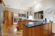 103 Aberdeen St Newtown VIC 3220 $1,190,000 - $1,290,000 Property Information This home is sure to impress with its handsome modern style blending with beautiful old world features. Tightly held in one family for over 20 years this home is one that you will fall in love with the moment you open the private front gate. Set in a prestigious location within walking distance to first class schools, the Geelong CDB, Pakington Street and set on a huge 849m2 with rear lane access makes this home ideal for families. From the front garden you are presented with classic Edwardian facade of the early 1900's perfectly framed with luscious gardens and mature trees. Once you step in the front gate you really feel like you could be miles away from the hustle and bustle. The home is elegant in every way with high ceilings, decorated cornices, stunning lighting, timber fretwork, double hung windows, high skirting boards and original lead lighting throughout. This home has been extended and renovated to suit the modern family and offers a well designed floor plan to suit younger children or teenagers. The main bedroom is spacious with walk in robe, huge recently renovated ensuite with gleaming large tiles, spa bath and clear framed shower. The 2nd bedroom is oversized with a beautiful outlook of the leafy garden through the bay window. Further 2 bedrooms are also oversized with built in robes. Delightful warm living areas invite family entertaining for a large number of guests, offering a lovely setting overlooking the pool and large paved courtyard. The kitchen is well positioned in the centre of the home with huge granite benches, double wall oven, 900mm stainless steel cooktop with canopy range hood, display cupboards and island bench. Separate formal dining room entices and commands admiration with stunning bay window and chandelier. The rumpus room is quite separate from the other rooms, is big enough for a lounge suite, billiard table and has huge double doors straight out to the swimming pool and also offers a brand new ensuite for quick trips to the bathroom for your guests and to use from the pool. Every day is a holiday with a tranquil pool (fully automated & solar heated) that completely beautifies the grounds as well as making the huge piece of land quite easy to manage. With paving all around the yard and lovely leafy gardens to make you feel like you are in a resort somewhere, this home really does make you want to relax and enjoy the day. Many other features including evaporative cooling, hydronic heating, log fire, crimsafe security screens/doors, alarm system, fully automatic watering system, new laundry with loads of storage, great sized study with built in storage, double garage with remote, internal access, rear lane access all on a huge and extremely rare 849m2. This home is a property you must inspect to truly grasp the grand style of what is on offer. Call Donna now to book your private inspection before this home is gone. Land Size 849 sqm Property Type House