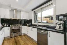2/254 West St Glenroy VIC 3046 First home buyers, young professionals and investors take note! This new 2 bedroom townhouse offers you a chance to enter the growing Glenroy market, near new and offering generous spaces this is an opportunity not to be missed. Comprising a bright and spacious living/dining area, gourmet kitchen with all the modern conveniences, powder room, European laundry, landscaped courtyard with deck and direct access to the remote access garage with storage space. Upstairs, 2 bedrooms await, both with BIR's and one with expansive city views, completing the picture is a stunning bathroom with separate shower and a bath. Other features include; ducted heating/cooling, dishwasher, stainless steel cooking appliances, ceaser stone bench tops, floor boards throughout, sheer and block out roller binds. Located in a quiet street and close to Sydney & Glenroy Roads, Gowrie Station, West St Shopping Centre, Glenroy Golf Course, transport, parklands, schools and more. Property ID: 1P2576 Property Type: Townhouse Garage: 1 Attachments: Virtual Tour Features: Air Conditioning Heating Area Views Built-In Wardrobes Close to Transport Close to Shops Close to Schools City Views Roller Door Access