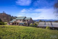 26 Hopetoun Rd Dover TAS 7117 $490,000 Property Information Situated on 5 acres of level to sloping pasture this Large 4 plus bedroom brick home has been built with a solid brick structure and features some of the most amazing fit outs of natural minor species Tasmanian timbers and enough sheds to satisfy even the largest of collectors or home business operators. Views reach over the surrounding farm land out to the bay and islands of Port Esperance which can be seen from almost every room in the house. The property features around 300m2 of shed space ranging from garages, open machinery sheds, workshops and more. The property has been extensively landscaped around the home offering a large rear outdoor entertaining area and easy care gardens. There is a large dam sufficient for a property of much larger magnitude where you can draw as much garden water as you will ever desire along with plenty of tank water catchment from the extensive covered roof areas. Downstairs the living areas are split level and semi open plan and has access to the entertaining areas. The magnificent timber work includes Tasmanian Blackwood internal doors and kitchen doors, Feature paneling and inserts in most rooms that feature, Celery Top Pine, Myrtle and King Billy Pine that are a testament to the quality fit out and investment that has been made into this home when it was built in 1993. To see more of this amazing property please email or call anytime to arrange a private inspection. Floor Area 212 sqm Land Size 2.06 Ha Tenure Freehold Property condition Excellent Property Type House Garaging / carparking Many Garages, Double lock-up, Single lock-up, Open carport Construction Brick veneer and Brick Joinery Aluminium Roof Colour bond Walls / Interior Gyprock, Brick, Timber Flooring Carpet, Other (Vynil), Polished, Timber and Parquetry Window coverings Drapes, Blinds Heating / Cooling Woodfire (Closed) Chattels remaining Blinds, Drapes, Fixed floor coverings, Light fittings, Stove, Curtains Kitchen Separate cooktop, Separate oven, Rangehood, Double sink, Breakfast bar, Pantry and Finished in Timber and Laminate Living area Formal dining, Separate dining, Open plan Main bedroom Double and Walk-in-robe Ensuite Separate shower, Spa bath Bedroom 2 Double and Built-in / wardrobe Bedroom 3 Double and Built-in / wardrobe Bedroom 4 Double and Built-in / wardrobe Additional rooms Attic, Conservatory / sunroom, Office / study Main bathroom Separate shower Laundry Separate Workshop Combined, Separate Views Bush, Water, Rural Aspect East Outdoor living Entertainment area (Uncovered, Paved and Concrete), BBQ area Fencing Partial, Materials (Post & Wire and Timber) Land contour Flat to sloping Grounds Landscaped / designer Garden Garden shed (Sizes: Refer to plans, Number of sheds: 4) Water heating Electric Water supply Tank (size: 50,000lt) Sewerage Septic Locality Close to shops, Close to schools