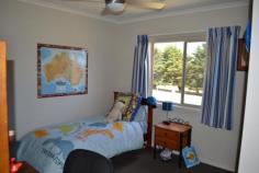 59 Skuses Rd Allansford VIC 3277 $599,000 City living in the Country Consider this very well presented 3 year old home on a quiet country road, it has expansive district views and everything a new family home offers. Comprising 4 bedrooms plus study, master with ensuite and WIR, central bathroom (separate bath and shower) and large laundry. The open plan living area features a well equipped kitchen with large walk in pantry, gas cook top, electric oven, dishwasher and breakfast bar, light filled dining area and living space. There is a second living room which is ideally set up for a parents retreat. Quality is evident throughout the home including tiled flooring in the traffic areas and carpet through the quiet areas. Ducted central heating, reverse cycle air conditioning and 3.5 kw solar power are an added feature. The double garage has an auto door and direct access to the home. A north facing sheltered patio, presents as a third living space ideal for entertaining and enjoying the large garden . The approx. 5 acres are subdivided into 3 well fenced paddocks protected by cypress plantations. A 10m x 7m colourbond shed comes with a mezzanine for extra storage. Water is never a problem, with 2 x 22,500 litre rain water tanks backed up with a bore & 22,500 litre tank. If you are looking for a quality lifestyle property away from the hustle and bustle but close enough to town, this property is well worth an inspection Price For Sale $599,000 Category House