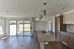 20 Maculan Crescent Westbrook QLD 4350 $449,000 Sensational New Home With Views - Price Drastically Reduced! $449,000 Property ID: 7818789 A BEAUTIFUL GJ Gardner home positioned with a great aspect and offering a sensational elevated outlook capturing rural views and sunsets. The new-built home is eligible for the First Home Owners Grant. Three living areas to suit the growing family at the centre of the home is and includes a lounge and dining space. A galley-style kitchen overlooks the family room and includes electric cooking appliances and a dishwasher. A reverse cycle air-conditioner is fitted in this room and concertina doors opening to the alfresco area. The alfresco looks across the large, fully fenced back yard, which has vehicle access. All four of the bedrooms are built-in, with a walk-in wardrobe and ensuite in the main bedroom. An activity room is outside the three kids’ bedrooms so everyone has their own living space. The family bathroom has a bath, shower and vanity fitted with a separate toilet adjacent. A double lock-up garage with remote controlled tilt-panel door is attached to the home. A 5,000L poly rainwater is in place in the back yard. Land Area 1,108.0 sqm