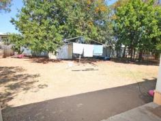 22 Don St Biloela QLD 4715 $190,000 Fantastic Investment Opportunity - Current Gross Return 7.9%* With a current gross return of 7.9%* look no further than this great investment opportunity. Located only minutes to the Biloela CBD you'll find this 3 bedroom residence with loads of potential. The open plan kitchen and dining lead into the formal living and family room with ceiling fans throughout. Bathroom and separate toilet. The rear entertainment area over looks the fully fenced back yard with lawn locker all on 688 square metres. Side car port accommodation and front porch. Currently rented for $290 per week on a fixed term lease. * Return calculated on total annual return of $15,080 divided by the list price of $190,000 to determine gross return percentage of 7.9%