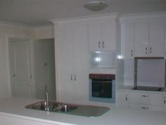 15 Bassett Crt Roma QLD 4455 $470,000 Modern Investment Opportunity 4 ample sized bedrooms. Main bedroom has a walk in robe and ensuite. Both bathrooms & laundry are tiled. Kitchen is finished in a glossy white includes dishwasher, wall oven and loads of cupboards. Double lock up garage attached to the home. 1231 square metre block surrounded by new homes.