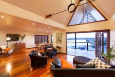 58 Charles St Tweed Heads NSW 2485 $1,200,000 Entertain in Style.Perched high on the hilltop Perched high on the hilltop this stylish family entertainer is blessed with a stunning vista of natural beauty. Overlooking the river to the distant breakers at Cook Island you'll never tire of this gorgeous outlook. A glance to the west and Mt Warning springs into view. The gated front walkway is immersed in subtropical greenery and opens out to an impressive pavilion like entry, then solid timber front doors open to reveal the expansive views you'll enjoy from almost every room. Polished timber floors feature throughout while sandstone tiling surrounds the pool. Extensive timber decks front and rear ensure shelter in all conditions. This beautiful home offers a cocoon of intimate privacy . Designed to be fabulously comfortable no matter what the outside conditions are. Impressive panoramic views of the river, ocean and hinterland to Mt Warning. Versatile design allows for one huge family home or dual occupancy. Upstairs accommodation includes, master bedroom and ensuite, two double bedrooms, bathroom, separate laundry, kitchen dining and living and adjoining covered balcony. Downstairs accommodation includes three double bedrooms, space for a kitchenette, living and adjoining covered balcony, bathroom and separate wc. and access to underneath the home where there is an all weather outdoor play area and terraced yard. The two pack and stone kitchen overlooks the tiled inground pool and wraps around to also adjoin the dining and living rooms so you're never isolated from your guests or children. The double lock up garage features a full sized loft, a suitable space for storage, man cave, office or gym. This sought after location in Charles St offers easy access to all the amenity of Tweed Heads and Coolangatta.