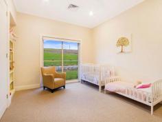 102 Baileys Ln Kurrajong Hills NSW 2758 $1,950,000 One of a Kind This stunning trophy property is impressive during the day and magical at night. It is situated in a quiet cul-de-sac in a prestige street of the breathtaking Kurrajong Hills only 5 minutes from the quaint caf's of Kurrajong Village. This almost brand new custom designed and built home is only 3 months old and is set on 10 picturesque acres, this home has been built to the highest standard. With quality inclusions and a timeless, spacious design this home oozes sophistication. As soon as you enter you realise that this home is like no other. With its high ceilings, impressive stone fireplace, large panelled glass windows to capture the undulating views, the amazing al-fresco area with its own fireplace and raked ceilings, you will never want to leave. Set on 5 cleared and 5 bush acres, this property's bottom boundary is the stunning crystal clear flowing waters of Little Wheeny Creek. Quality features include; • Large light filled combined casual dining and lounge room • Spacious media room or formal lounge room • 4 double sized bedrooms all with quality BIR's • Expansive main bedroom with a WIR sure to impress • Impressive Main bathroom with free standing bath and rain shower • Ensuite access from the 4th guest bedroom • Custom made polyurethane bathroom cabinets with stone bench tops • Luxurious wool carpet underfoot • Indulgent Ensuite to main bedroom with freestanding bath in front of large panelled glass window. Perfect to soak away in whilst admiring the beauty of the rolling hills • Large triple car garage with plenty of space forstorage and work bench. • Quality kitchen and butlers pantry with stone bench tops and quality European appliances • Ducted air conditioning, security alarmed, an abundance of internal storage. • Enviable laundry with stone bench tops, plenty of bench space and cupboards • Data networked in all bedrooms and both lounge areas • Plenty of concreted space for parking the cars or toys