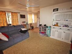 22 Don St Biloela QLD 4715 $190,000 Fantastic Investment Opportunity - Current Gross Return 7.9%* With a current gross return of 7.9%* look no further than this great investment opportunity. Located only minutes to the Biloela CBD you'll find this 3 bedroom residence with loads of potential. The open plan kitchen and dining lead into the formal living and family room with ceiling fans throughout. Bathroom and separate toilet. The rear entertainment area over looks the fully fenced back yard with lawn locker all on 688 square metres. Side car port accommodation and front porch. Currently rented for $290 per week on a fixed term lease. * Return calculated on total annual return of $15,080 divided by the list price of $190,000 to determine gross return percentage of 7.9%