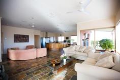 58 Lillecrapp Rd Ilparpa NT 0870 $899,900 ALICE SPRINGS - BREATHTAKING PANORAMA! Possessing impeccable presentation and privacy, this 1.54 hectare property is ready for the thriving family who seek a residence of quality construction and clever design complemented by magnificent views and space. Built in 1999, the double storey residence sits at the end of the gravel drive perched in a scenic setting with the Western Mac Donnells as your backdrop. Take the external stairs to the first floor and pause to see how this home showcases the vistas before you. Then step inside to a wonderful open plan space encompassing a magnificent kitchen, walk-in pantry, informal dining and extended living room. With double glass doors to each of the forward balconies and extra-large windows surrounding the floor, healthy natural light and a cool breeze will never be in doubt. The Tasmanian Blackwood kitchen is ready for the master chef in you. Extensive bench tops and cupboards together with a walk in pantry will ensure this will be a popular spot to chat and cook. Dinner will be a pleasure taken at any of the alfresco spots inside or out or in the formal dining room on the eastern side. The impressive master bedroom features larger glass windows guaranteeing this to be a real room with a view. A delightful ensuite and roomy walk in robe will be well received. Hallway storage, powder room and a rear verandah overlooking the pool and out to the ranges complete the first floor tour. Down the timber internal stairs to the family zone of the home. Three more bedrooms, a spacious bathroom with sunken bath and airy laundry surround the tastefully tiled living room. Summer entertaining from here will be a must with an inviting pool and waterfall in a unique bush setting not far from the door. The virtues of this property continue with a separate elevated one bedroom home a short walk from the main residence. Verandahs front and rear, parking and slate floors make this a comfortable abode for family, friends or a paying tenant. A large 9 x 6m powered shed with three phase power, a double garage and an additional carport will provide parking for the family vehicles or a tradesman's equipment. With nearly four acres on offer, the current owners have carefully designed the landscaping and reticulation to produce a stunning array of native plants and shrubs. Effort has been made to contour the block to protect the paths and plants. A vegie patch has provided regular plants and herbs to the kitchen. If all this is not enough to excite you, then you must take the time to visit this wonderful property as there is so much more on offer. Land Size: 1.54hectares Zoning: Rural Living Year Built: 1999 Council Rates: $1137pa Rental (est): $900 - $950p/w Other features: Built-In Wardrobes,Garden,Secure Parking,Formal Lounge,Separate Dining,Terrace/Balcony 5 bedrooms 2 bathrooms 8 car parks Land Area 1.54 hectares Car Parks: 4 Double garage Double carport Swimming Pool Air Conditioning