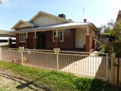 12 Elizabeth St Parkes NSW 2870 $305,000 Unique With Character This home is situated in one of the most sought after streets in Parkes. You are within walking distance to the CBD, a lovely friendly tree lined street and a home that features ornate ceilings, polished floorboards and stain glass windows. There are four large bedrooms, two living areas, renovated kitchen and bathroom, ducted evaporative a/c, natural gas heating plus an open fire place. The forth bedroom or loft has its own reverse cycle a/c plus in roof storage. The entertaining area is spacious, there is rear lane access, single car garage and secure yard. DETAILS ID #: 0000269298 Price: $305,000 Type: House Bed: 4 Bath: 1 Car: 1 Land Area: 637 sqm (approx)