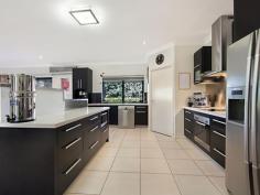 189 Ring Rd Alice River QLD 4817 $585,000 Owners Committed Elsewhere - All Offers Considered! Meticulously cared for and loved ! Stunning property features ! Manicured outside and spectacular inside! Attention to detail and quality living personified ! If you have had a remote thought of acreage living - you simply MUST come to this home ! The owners are committed to purchasing elsewhere and must sell this home ! Built in 2007, this property was designed by a daughter and built by her father to meet all of her needs. The home was personally designed for lifestyle. Whilst the home flows from zone through to zone, privacy can be created and families can spread out ! A floor plan has been attached to help you visualise the intelligent design. You are Wooed from the front entrance. Stylishly tiled from the outside portico through the double doors into the entrance. Modern lighting starts with a spectacular design inside the doorway. The first of four living areas greet you. A wonderful formal lounge, guest or children's retreat - this front living space is surrounded by three queen size bedrooms. Concertina doors allows you to close this area off from others and features : Split A/C in every room (including living), quality carpets, fans, large windows and louvers for cross ventilation. The hub of any home is the kitchen. Completely surrounded by spacious dining, the second of your living areas and the outdoor entertaining area - everyone has room to gather together here ! Sensibly tiled throughout, this kitchen boasts stainless steel bench tops, open and spacious design, quality appliances, and walk through pantry ! Cupboard space is vast - I dare you to fill this kitchen ! Windows slide open to serve the outside guests. Get out of your car and bring your groceries straight into the pantry - so easy ! The WOW main bathroom (with separate bath to shower) is stunning. Separate toilet. Brilliant cupboards and bench space in the Laundry with oooodles of room for large washing appliances. Master Suite - Stunning ! Walking through large double doors you are first greeted with a private lounge or study (third living area). Retreat to your own area. Two separate walk in robes - one each! The ensuite is delightfully spacious and will woo you with design ! Enormous room for king size bed, furniture and a whole lot more. Wonderful ventilation and air-conditioning. Elongated tiled outdoor area is under roof and also under shade cloth. Room for outdoor lounges (fourth living space), dining tables and outdoor bar. External power for fridges etc. This outdoor entertaining area is fully surrounded by gorgeous gardens and fenced to allow your pets to be away from the party. It is a magical escape from the bustle of everyday living and work. Storage is magical. Large walk in Linen / Storage room is accessed from the second living area. A wonderful nook was designed for a cellar, however your personal use of this designed area could be endless. Linen cupboards, built in wardrobes... no need for things to be lying around. The SHED ... The SHED !!! It is awesome. One third is air-conditioned for a workshop, gym or studio. Two bay car parking space with storage space surrounding all sides and in the rafters ! 4022 square metres is divided into four fenced zones. Double gate Rear yard access. Parking area for boats and trailers. Huge Dog run ! Every Home Needs a Beach Volleyball Court ... right ??? Have hours of fun here !!!! The agent is so excited to give you the opportunity to purchase this brilliant home ! The agent and her team will arrange access for you so please contact her 7 days a week. The agent is engaged to help the owners secure their next home which they have committed to and is the reason for sale. Call today !