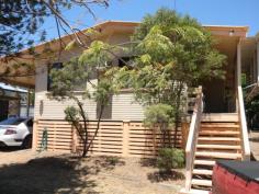 22 Don St Biloela QLD 4715 $190,000 Fantastic Investment Opportunity - Current Gross Return 7.9%* With a current gross return of 7.9%* look no further than this great investment opportunity. Located only minutes to the Biloela CBD you'll find this 3 bedroom residence with loads of potential. The open plan kitchen and dining lead into the formal living and family room with ceiling fans throughout. Bathroom and separate toilet. The rear entertainment area over looks the fully fenced back yard with lawn locker all on 688 square metres. Side car port accommodation and front porch. Currently rented for $290 per week on a fixed term lease. * Return calculated on total annual return of $15,080 divided by the list price of $190,000 to determine gross return percentage of 7.9%