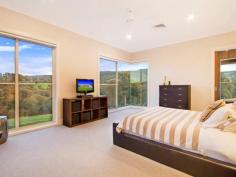102 Baileys Ln Kurrajong Hills NSW 2758 $1,950,000 One of a Kind This stunning trophy property is impressive during the day and magical at night. It is situated in a quiet cul-de-sac in a prestige street of the breathtaking Kurrajong Hills only 5 minutes from the quaint caf's of Kurrajong Village. This almost brand new custom designed and built home is only 3 months old and is set on 10 picturesque acres, this home has been built to the highest standard. With quality inclusions and a timeless, spacious design this home oozes sophistication. As soon as you enter you realise that this home is like no other. With its high ceilings, impressive stone fireplace, large panelled glass windows to capture the undulating views, the amazing al-fresco area with its own fireplace and raked ceilings, you will never want to leave. Set on 5 cleared and 5 bush acres, this property's bottom boundary is the stunning crystal clear flowing waters of Little Wheeny Creek. Quality features include; • Large light filled combined casual dining and lounge room • Spacious media room or formal lounge room • 4 double sized bedrooms all with quality BIR's • Expansive main bedroom with a WIR sure to impress • Impressive Main bathroom with free standing bath and rain shower • Ensuite access from the 4th guest bedroom • Custom made polyurethane bathroom cabinets with stone bench tops • Luxurious wool carpet underfoot • Indulgent Ensuite to main bedroom with freestanding bath in front of large panelled glass window. Perfect to soak away in whilst admiring the beauty of the rolling hills • Large triple car garage with plenty of space forstorage and work bench. • Quality kitchen and butlers pantry with stone bench tops and quality European appliances • Ducted air conditioning, security alarmed, an abundance of internal storage. • Enviable laundry with stone bench tops, plenty of bench space and cupboards • Data networked in all bedrooms and both lounge areas • Plenty of concreted space for parking the cars or toys