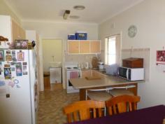 5 Brolgan Rd Parkes NSW 2870 $235,000 Warm & Inviting This home is as neat as a pin, there are three bedrooms, two of the bedrooms have built-ins, there is a spacious lounge room, kitchen/dining area and sun room. The 2 way bathroom has been renovated, the kitchen is practical, there is ducted reverse cycle a/c and bottle gas heating. The yard is secure and there is a single attached garage plus a garden shed. There is a covered entertaining area on the back of the house. DETAILS ID #: 0000269361 Price: $235,000 Type: House Bed: 3 Bath: 1 Car: 1 Land Area: 685 sqm (approx)