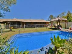 23 Back Creek Rd Beerwah QLD 4519 $700,000 Large Property! Large Home! Great Price! Great acreage in town (over 3.5 acres) with 2 complete homes under 1 huge roof! The property offers the quality lifestyle that only a large acreage can offer with the huge home (over 360m2 under the roof!) specifically designed to accommodate 2 large families living separately under the same roof. On Offer we have: 1. Property • 3.5 acres app. level and usable fenced property, ideally positioned to take advantage in the future of the ever growing Beerwah township. • 11 year old Coral Brick & tile home with over 360m2 app. under the roof 2. 2 Complete residences, under the same roof. Residence No 1. • 4 Bedrooms with build ins, main with en suite and walk in robe • 2 Bathrooms and 2 toilets • Large kitchen and large dinning/ living with bay windows and sliding doors for natural light leading to the undercover entertainment area and the in ground swimming pool • Separate family room • Large veranda on the front and back overlooking the enclosed entertaining area with a gazebo and in ground swimming pool. Residence No 2. • 3 Bedrooms with build ins • Brilliant 2 way bathroom, separate toilet and wash basin room • Great kitchen with large dining room/living room • Separate family room • Ducted vacuum throughout the house. The list of what this property is offering is endless! Situated in the thriving township of Beerwah with its progressive shopping center (Woolworths, ALDI, Super IGA, brand new shopping center) public transport (Trains and Buses) as well as public and private primary and high schools, approximately 20min. from the glorious Sunshine Coast Beaches and just a short drive to Brisbane (under 1 hour app.) the property is perfectly positioned to take advantage for the ever expanding Beerwah township. For your own private inspection of this Sunshine Coast Hinterland paradise please contact the exclusive agent today.