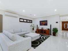 64 Monaco Circuit Epping VIC 3076 Wow 2 Master Bedrooms! Absolutely stunning in looks, be prepared to fall in love with this contemporary residence. This nearly new home has all the entertainment options you'll ever need...ready to be enjoyed by the entire family! From the moment you arrive at your dream destination, all the work has already been done. With refined quality throughout, the internal layout is saturated by natural light and offers a free flowing floor plan consisting formal entry, study/ office, comfortable lounge / theater, modern kitchen including wide stainless steel appliances, stone bench top & walk in pantry, open plan meals and family area. Boasting two beautiful hotel-style ensuites, the other large bedroom also has BIR and a sparkling central bathroom. The presence of huge outdoor area / alfresco with beautiful landscaped gardens highlights the home's practicality and functionality for everyday family living. Features are numerous and include ducted heating, cooling, alarm system, video intercom, high ceilings, quality window furnishings throughout, dishwasher, ducted vacuum, double remote garage, fully landscaped, solar panels (4.5kw) saving you $$'s and much more. There's simply too much to mention in words, only an inspection will do. Have a look today, before it sells! Photo ID Required.