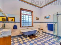 101 Osborne Ave Woodville Park SA 5011 A Stunning Character Bungalow That's Renovated, Extended and Positioned in a Beautiful Tree Lined Street OPEN SAT 12/9 12-12:40PM & WED 16/9 5:30-6PM From its classic facade to its impeccable gardens, this stunning family home has been completely transformed by a sympathetic under main roof extension that is committed to modern day practical living. With gorgeous decorative ceilings, ornate architraves and polished timber floor boards, this captivating home will certainly appeal to all. The home comprises an elegant entrance with stunning timber paneling that flows through to the central formal lounge. There is plenty of accommodation with 4 huge bedrooms, the master with built in wardrobes. The huge family bathroom continues the same period theme and includes a claw foot bath, shower with frameless glass surround, vanity and toilet. The oversized laundry provides ample built in storage and adjoins second WC. The beautifully crafted Blackwood kitchen has ample bench and cupboard space featuring a quality appliance package that overlooks the expansive open plan dining/living area with floor to ceiling picture windows that integrates seamlessly with the fabulous outdoor setting. The fully paved outdoor entertaining area is ideal for year-round entertaining amidst the secluded garden surrounds whilst the lovely lush lawn area has ample room for children's recreation. The beautifully landscaped allotment of approximately 720m2 (approx) with a North facing rear comes complete with a private bore plumbed to the irrigation system. The home has ample off street parking including a carport for 2 vehicles. Musicians will love the purpose built music studio which has been sound insulated and features acoustic wall tiles for that authentic musical experience. This space could easily be converted to a games room or teenagers retreat if desired. Adjoining the studio is the large workshop which is ideal for tradies or the home handyman. All of the major renovations have been carried out including new ceilings, new roof a full rewire and new plumbing as well as ducted air conditioning and gas heating for year round comfort. The home is beautifully positioned within walking distance to the train, the conveniences of Port Road and only minutes away from the Queen Elizabeth Hospital. A fine family home that is seldom found in this prized location.