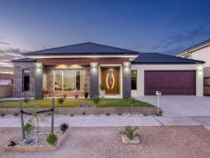 64 Monaco Circuit Epping VIC 3076 Wow 2 Master Bedrooms! Absolutely stunning in looks, be prepared to fall in love with this contemporary residence. This nearly new home has all the entertainment options you'll ever need...ready to be enjoyed by the entire family! From the moment you arrive at your dream destination, all the work has already been done. With refined quality throughout, the internal layout is saturated by natural light and offers a free flowing floor plan consisting formal entry, study/ office, comfortable lounge / theater, modern kitchen including wide stainless steel appliances, stone bench top & walk in pantry, open plan meals and family area. Boasting two beautiful hotel-style ensuites, the other large bedroom also has BIR and a sparkling central bathroom. The presence of huge outdoor area / alfresco with beautiful landscaped gardens highlights the home's practicality and functionality for everyday family living. Features are numerous and include ducted heating, cooling, alarm system, video intercom, high ceilings, quality window furnishings throughout, dishwasher, ducted vacuum, double remote garage, fully landscaped, solar panels (4.5kw) saving you $$'s and much more. There's simply too much to mention in words, only an inspection will do. Have a look today, before it sells! Photo ID Required.