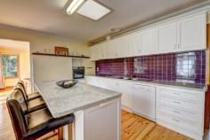 401 Barkly St Buninyong VIC 3357 $360,000-$375,000 Property ID 38233 This very tidy weatherboard home has heaps to offer the first home buyer to the astute investor. Located in the beautiful township of Buninyong and just a short walk to the local bus stop and all of the village caf's/ shopping. The home offers 3 bedrooms all with built in robes, modern new window furnishings & screens. separate cosy lounge with combustion heating adjoining a spacious kitchen with huge centre bench with modern cabinetry as slow closing draws, dish washer, gas hot plates, electric wall oven and a great walk in pantry that will please. For the whole family to enjoy a large family /dining room with gas heater and reverse cycle A/c, polished timber floors, rear alcove currently utilised as a study area. Externally double plus garage and workshop area with 3 phase power, remote doors, games room or storage shed, enclosed rear yard for the dogs and established gardens front and rear. Land area 0.10Ha