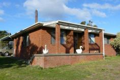 2 Eagle View Rd Nubeena TAS 7184 $220,000 BRICK HOME WITH BAY VIEWS Family friendly home on a large corner block overlooking Parsons Bay, this property enjoys privacy and a sunny location. With a wood heated lounge, eat-in kitchen, 3 bedrooms and a large front deck it is within walking distance of the school, shops, cafes and tavern. The large triple carport by the back door provides plenty of undercover parking and there are 3 garden sheds plus a fowl house. With over 30,000 litres of tank water and a large roof catchment, there is plenty of water for the garden. In need of some upgrading including internal painting and floor coverings, there is a real opportunity to choose your colour scheme. Selling as part of a deceased estate, all reasonable offers will be considered by the Executors. Other features: Built-In Wardrobes,Close to Schools,Close to Shops,Fireplace(s),Formal Lounge Elders Property ID: 8666547 3 bedrooms 1 bathrooms 5 car parks Land Area 1552 square metres Car Parks: 2 3 car carport