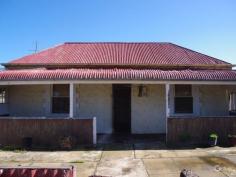 18 Milne Terrace Moonta SA 5558 $80,000 Quaint character cottage Located on 2 allotments sec 2292 and sec 2293 this cottage offers 3 bedrooms with quite a large lounge area. There is an eat in kitchen with numerous cupboards and a bathroom with separate shower and vanity, laundry and separate toilet. Located on a total of 2169m2 with numerous sheds and stone out buildings. Well located with bitumen roads from Moonta. This property is on an annual licence (contact agent for further details).