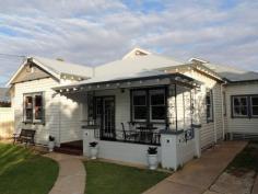 42 Gummow St Swan Hill VIC 3585 $429,000 An Enviable Lifestyle Property A substantial and beautifully renovated home in this sought after address offers buyers the chance of a lifetime. Measuring over 25 squares of living space. The elegant sitting room with leadlight feature windows and cosy electric log fire is a delightful room. The grand formal lounge opens to a huge dining room or family room with bi fold doors to a superb alfresco area complete with outdoor kitchen and automatic blinds. The modern chef quality kitchen features a large walk in pantry and premium appliances. The master bedroom includes an ensuite and the other three bedrooms are serviced by two further bathrooms. The study has a built in desk. The laundry is huge and includes many built in's. Ducted heating and cooling is throughout the home and the garage and workshop has rear lane access. Property Snapshot Property Type: House Construction: Weatherboard Land Area: 758 m2 Features: Built-In-Robes Dishwasher Ducted Cooling Ducted Heating Ensuite Established Gardens Lounge Study Undercover Entertainment Area WorkShed